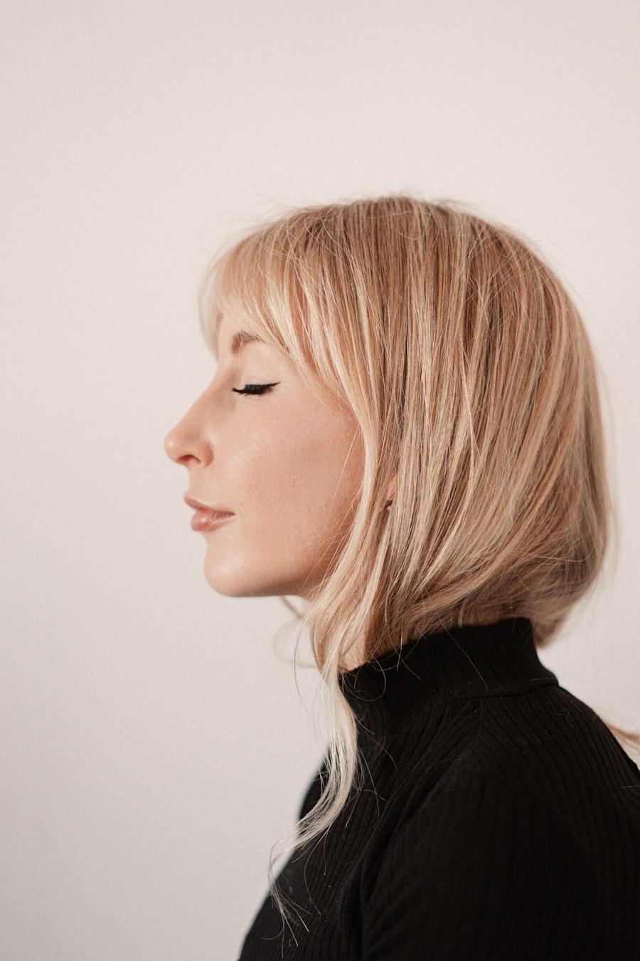 Model with radiant, dewy glass skin